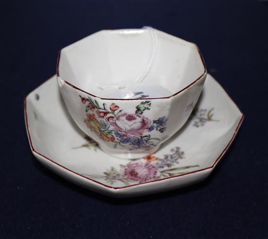 A Chelsea red anchor period octagonal tea bowl and saucer, c.1756,